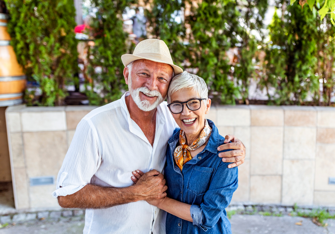 A couple reviewing their Medicare options together